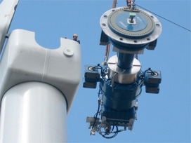 Typical components of a wind turbine being lifted into position